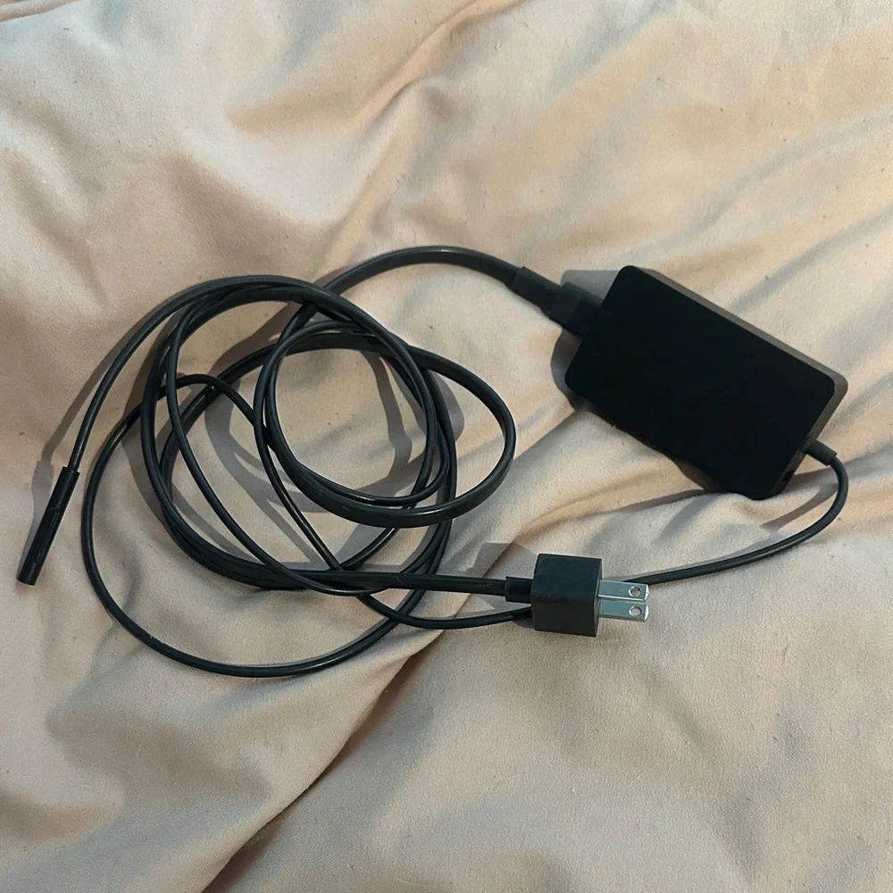 Set of 2. Microsoft pro charger. listing Includes 2 chargers. 65w